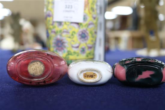 Three Chinese snuff bottles and a yellow ground Chinese vase
